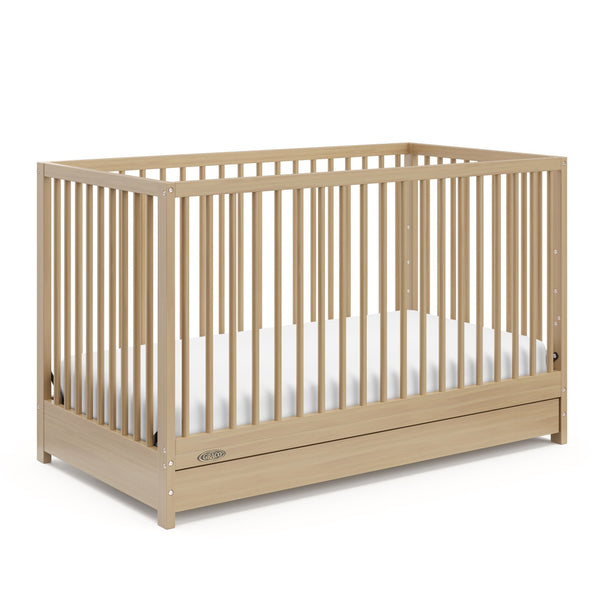 Graco Teddi 4-in-1 Convertible Crib with Drawer, Driftwood A0