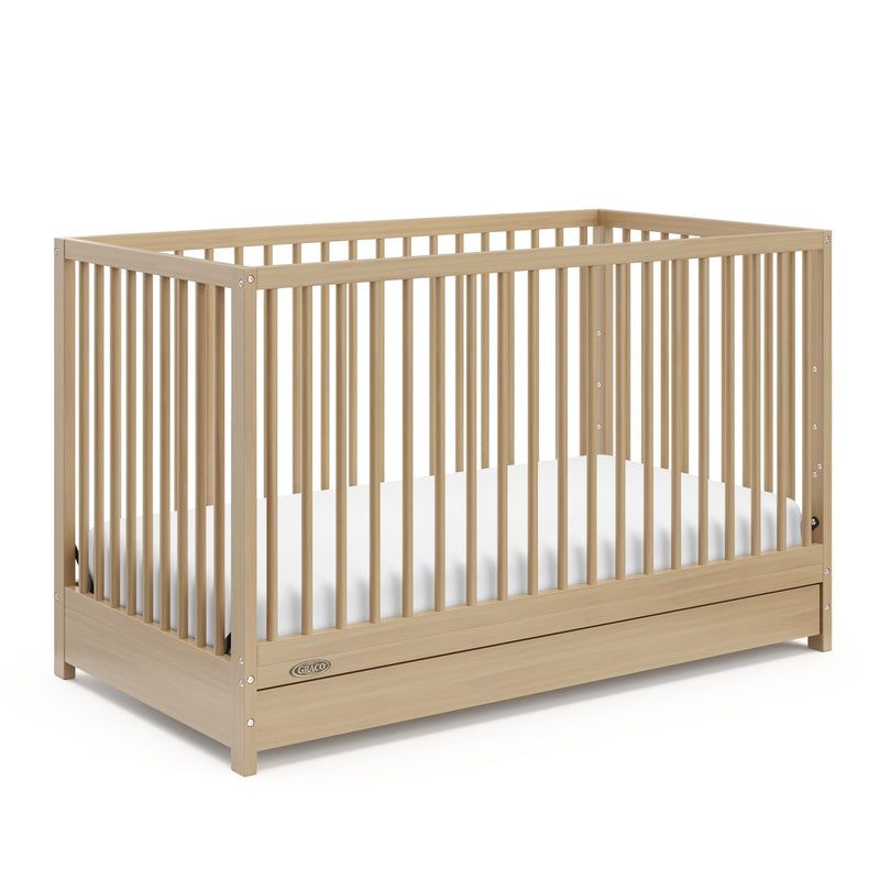 Graco Teddi 4-in-1 Convertible Crib with Drawer, Driftwood A0